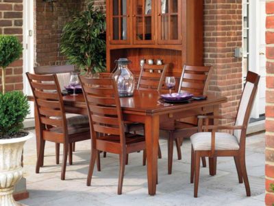 The Canal Dover Ashville Collection features beautiful red wood, ladderback chairs, and can seat up to six guests.